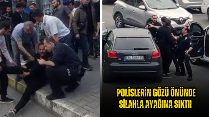 Polislerin gözü önünde silahla ayağına sıktı!